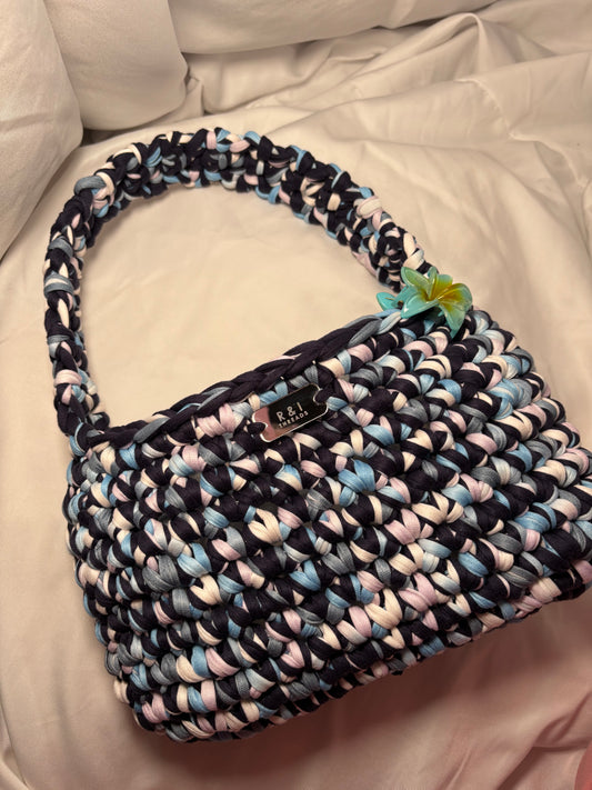 Multi coloured over shoulder handbag